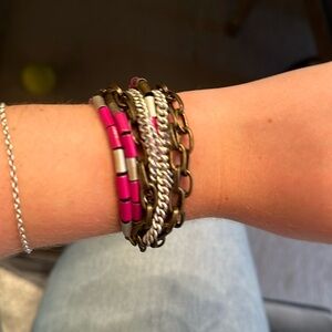 Gold, silver, and magenta bracelet